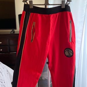 Men’s black and red “Shooters Brand” sweatsuit, barely worn. In great condition